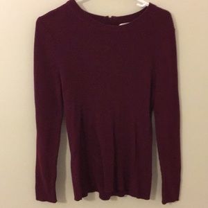 purple shirt with zipper in back